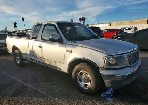 2001 Ford F150 из США, поврежденный, VIN 1FTZX17221KC13666